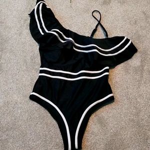 Black ruffled one-piece swimsuit